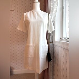 REFORMATION white mini front pocket dress